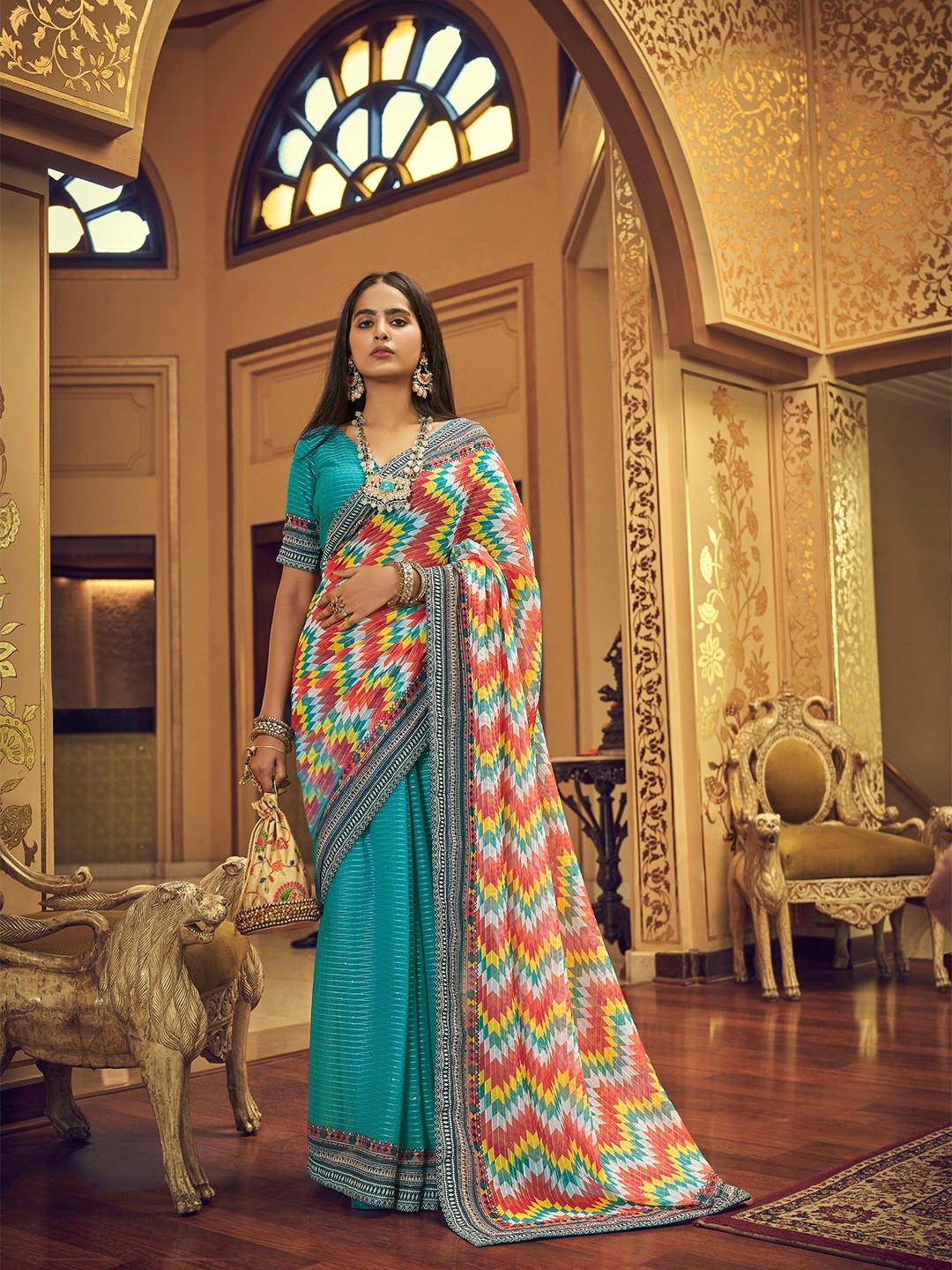 

Vrundavan ethics Blue & Pink Sequinned Pure Georgette Leheriya Saree