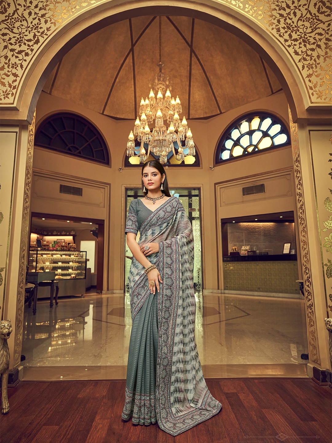 

Vrundavan ethics Grey & Maroon Floral Sequinned Pure Georgette Leheriya Saree