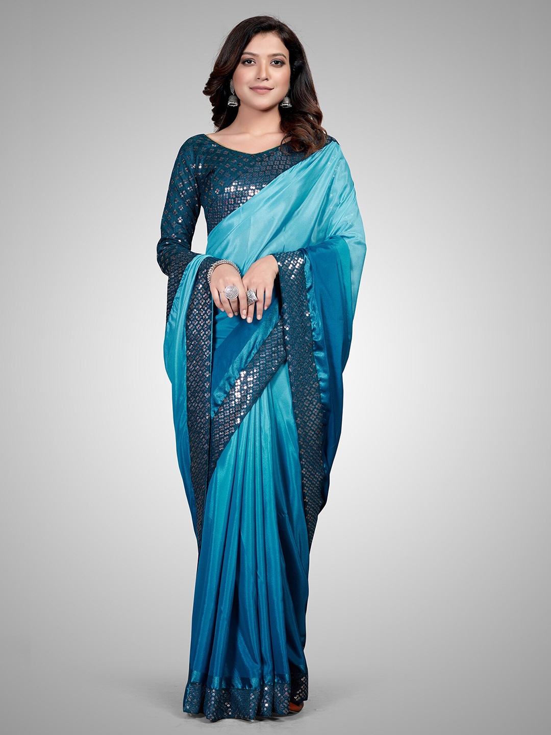 

Granthva Fab Turquoise Blue Sequinned Silk Blend Saree