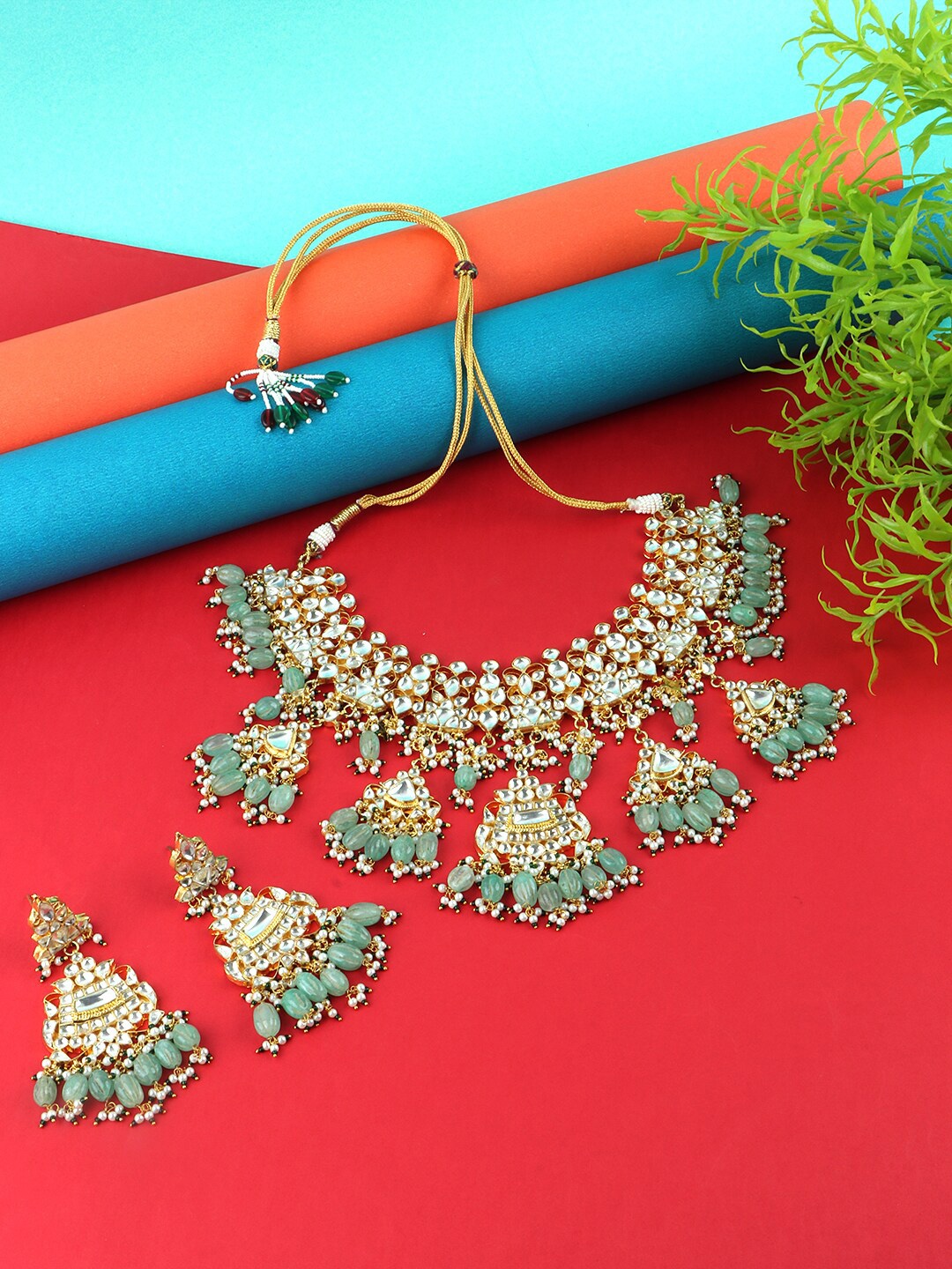 

AURAA TRENDS 22 KT Gold-Plated Kundan-Studded & Beaded Jewellery Set, Green