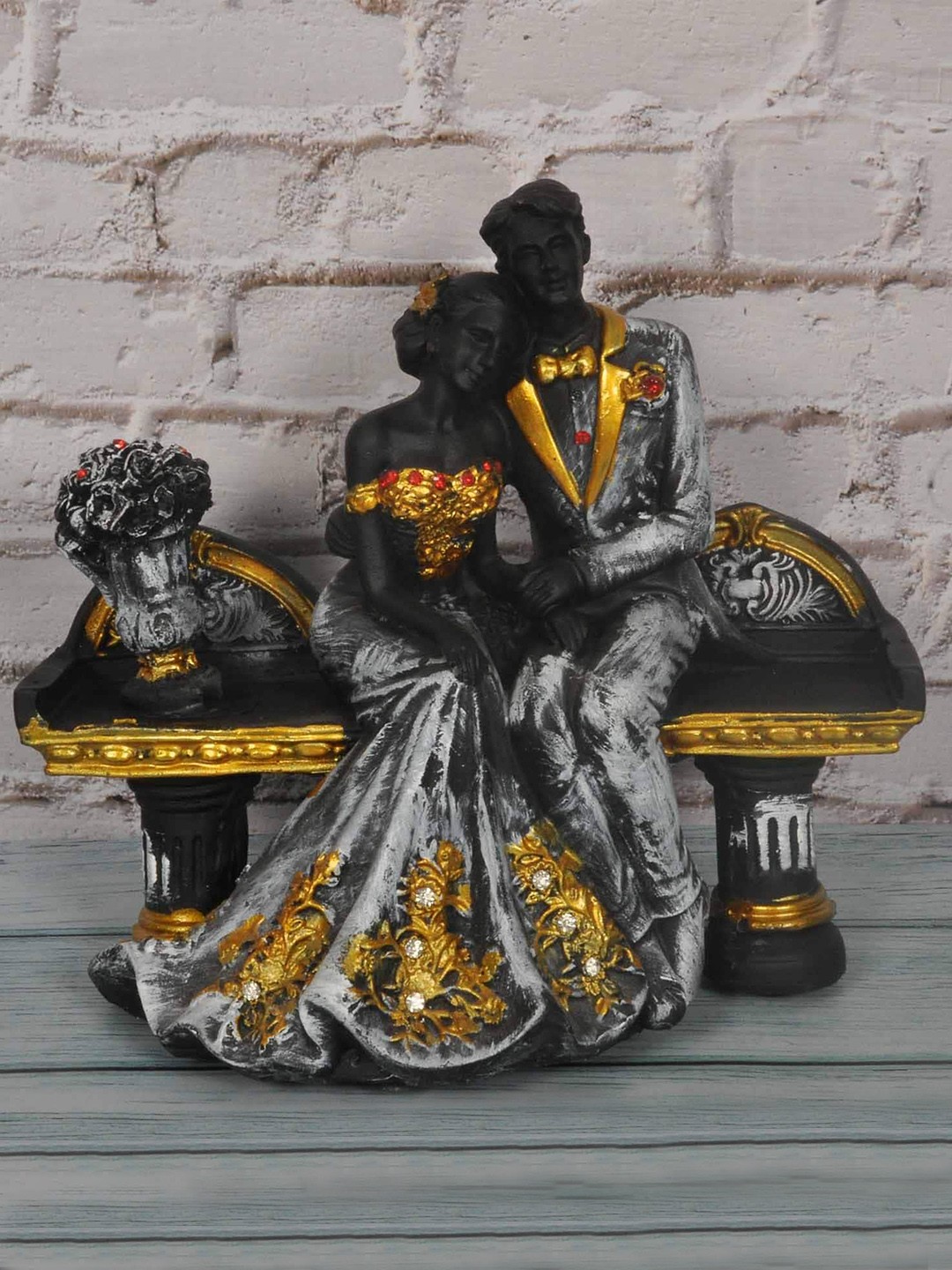 

SHREE KALA HOME DECOR Women Black & Gold-Coloured Couple Sitting