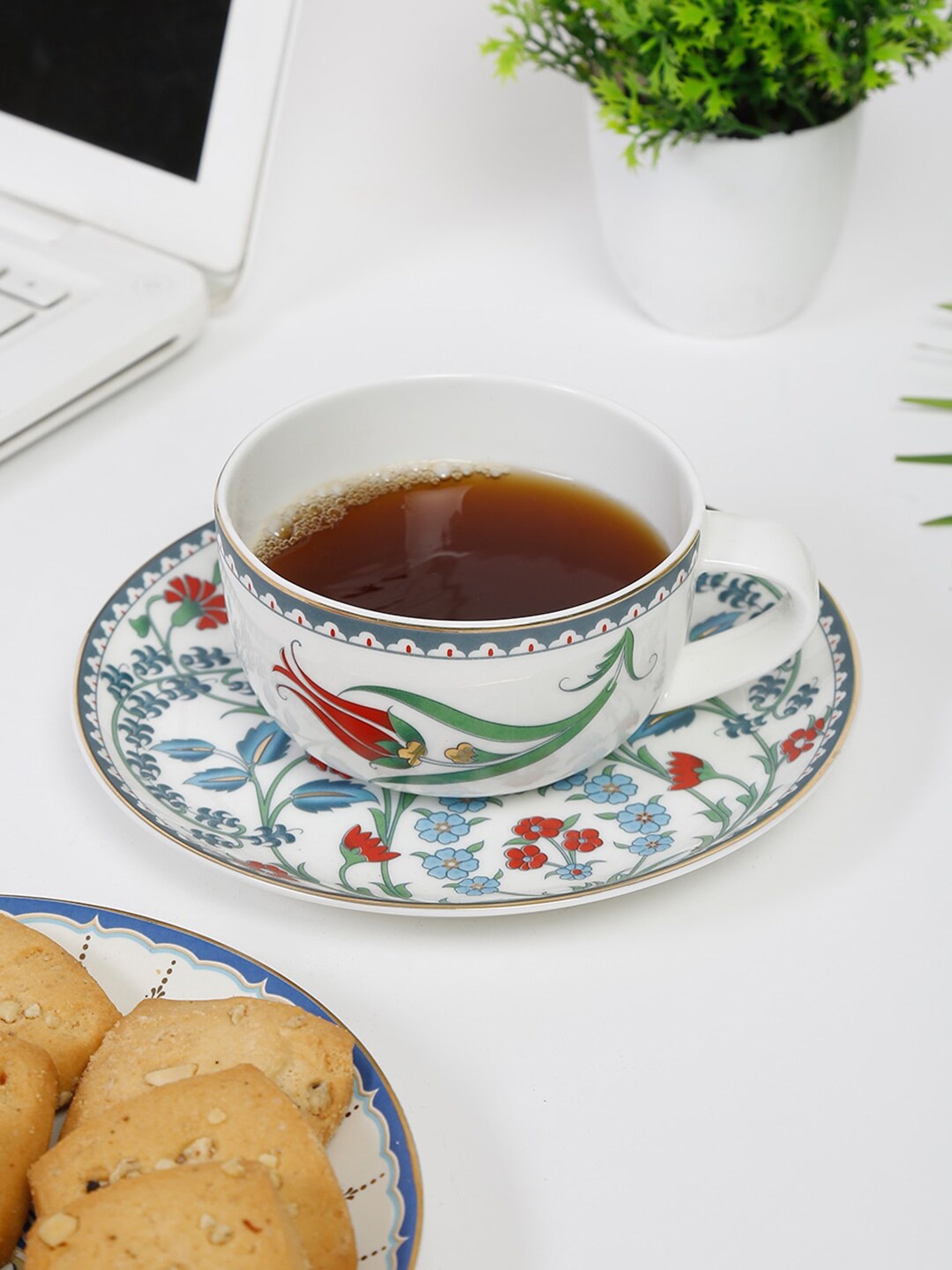 

Fabindia Avasa White & Blue Floral Printed Bone China Glossy Cups and Mugs