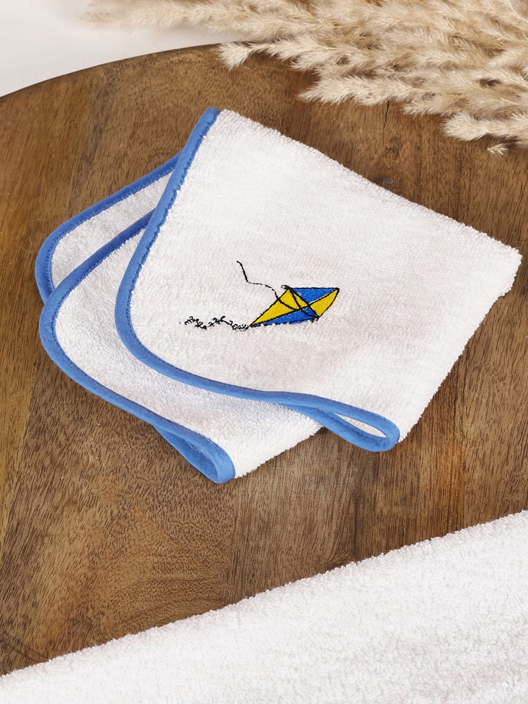 

Fabindia White & Blue Kite Embroidered 350 GSM Cotton Face Towel