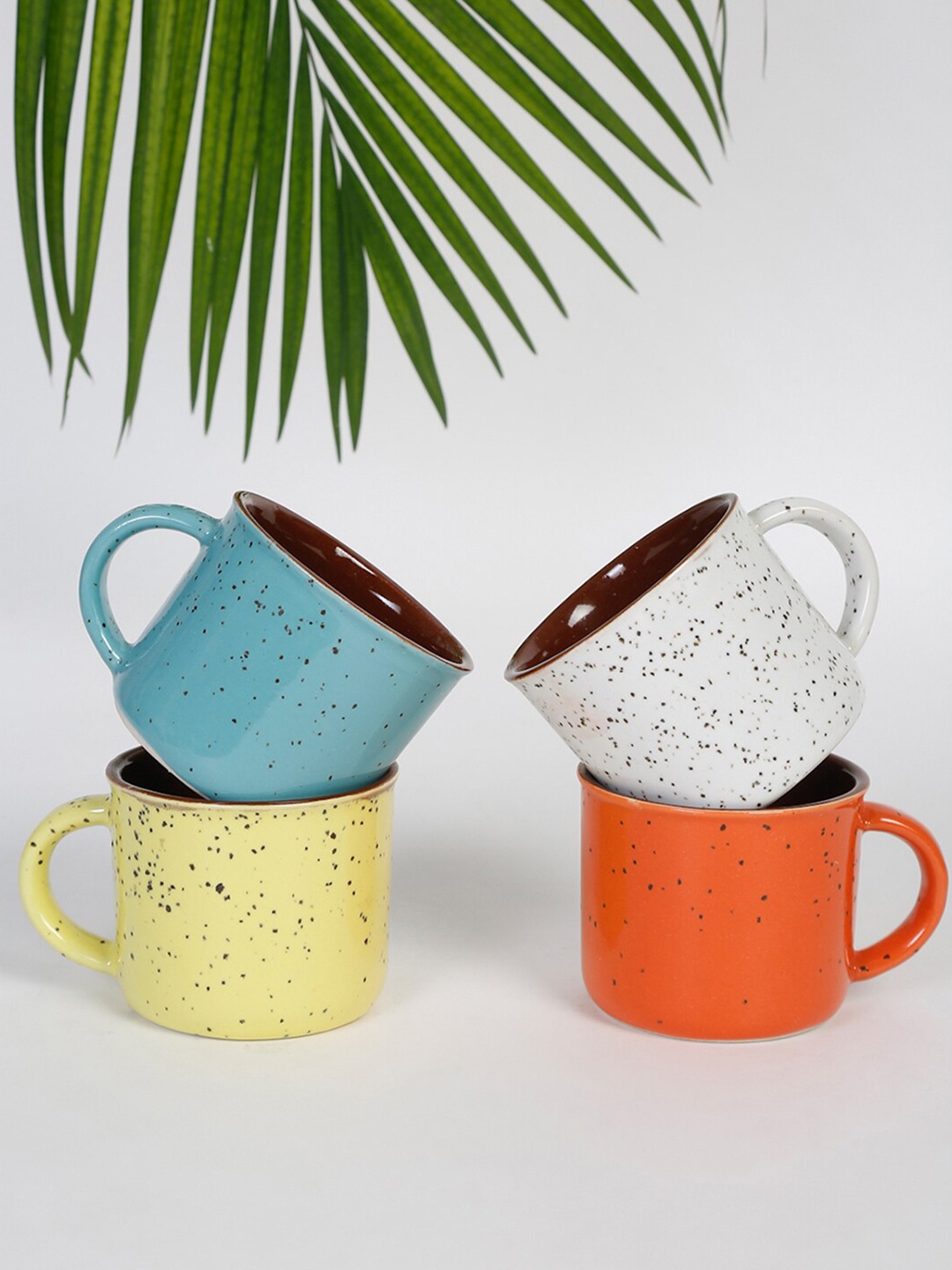 

Fabindia Itish 4 Pieces Stoneware Glossy Set of Mugs, White