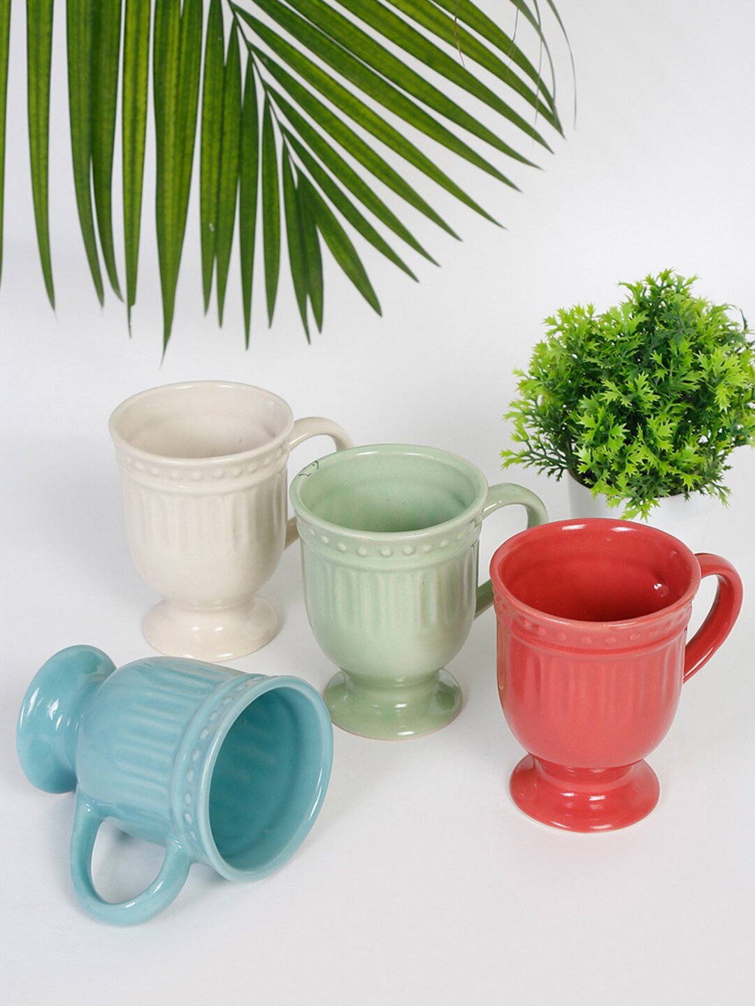 

Fabindia Divyat Set Of 4 Textured Stoneware Glossy Set of Mugs, Blue