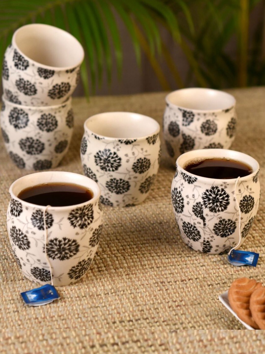 

Unravel India White & Black Set of 6 Floral Motif Ceramic Matte Coffee Mugs 110 ml Each
