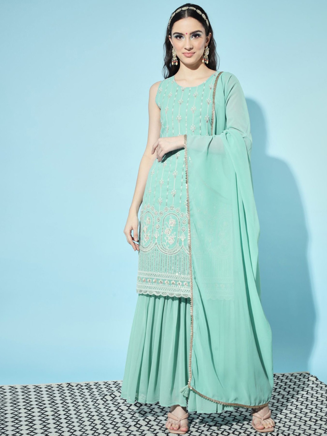 

Shopping Queen Women Turquoise Blue Floral Embroidered Kurta with Sharara & Dupatta