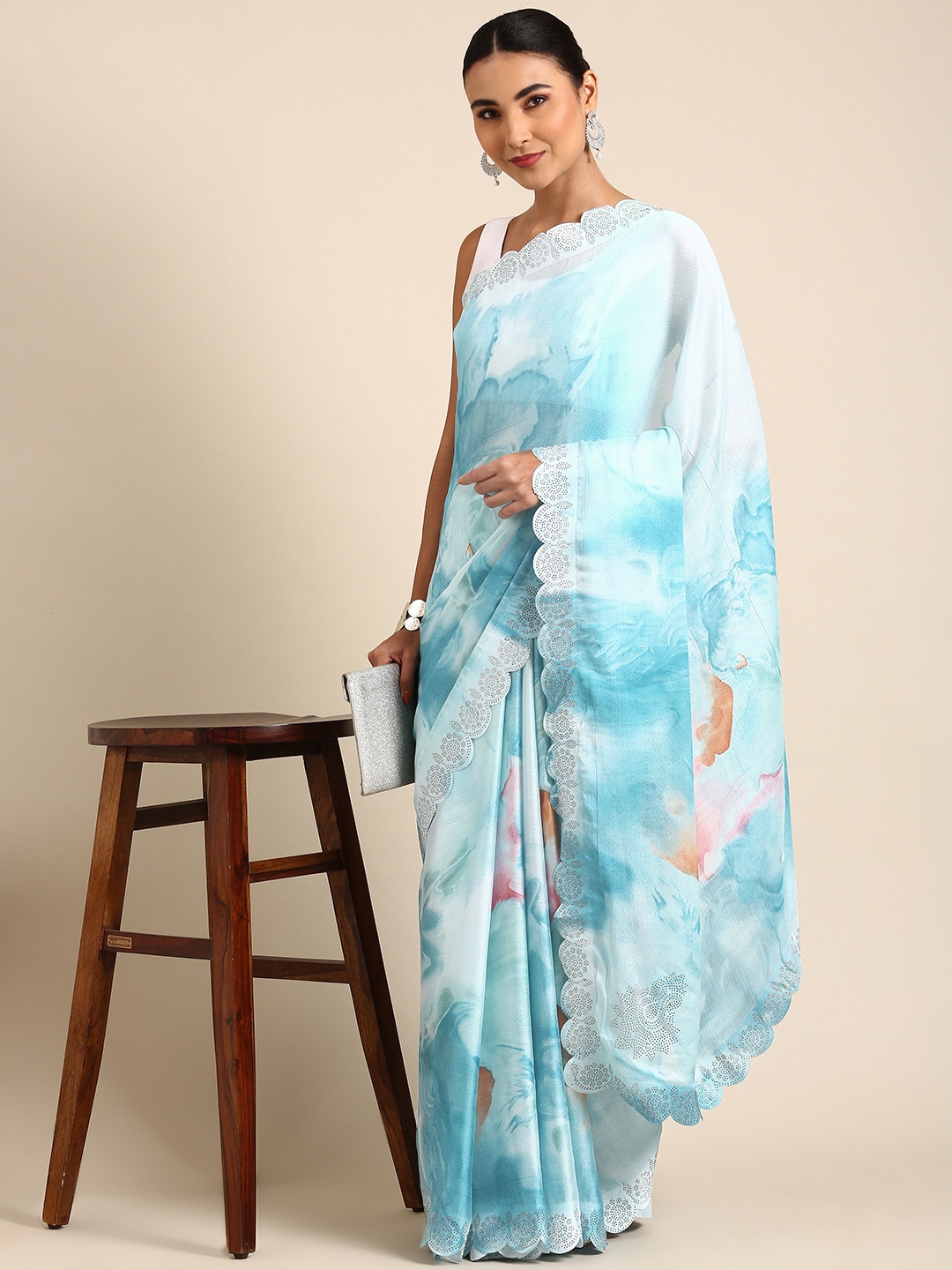 

Mitera Blue Sequinned Pure Chiffon Saree