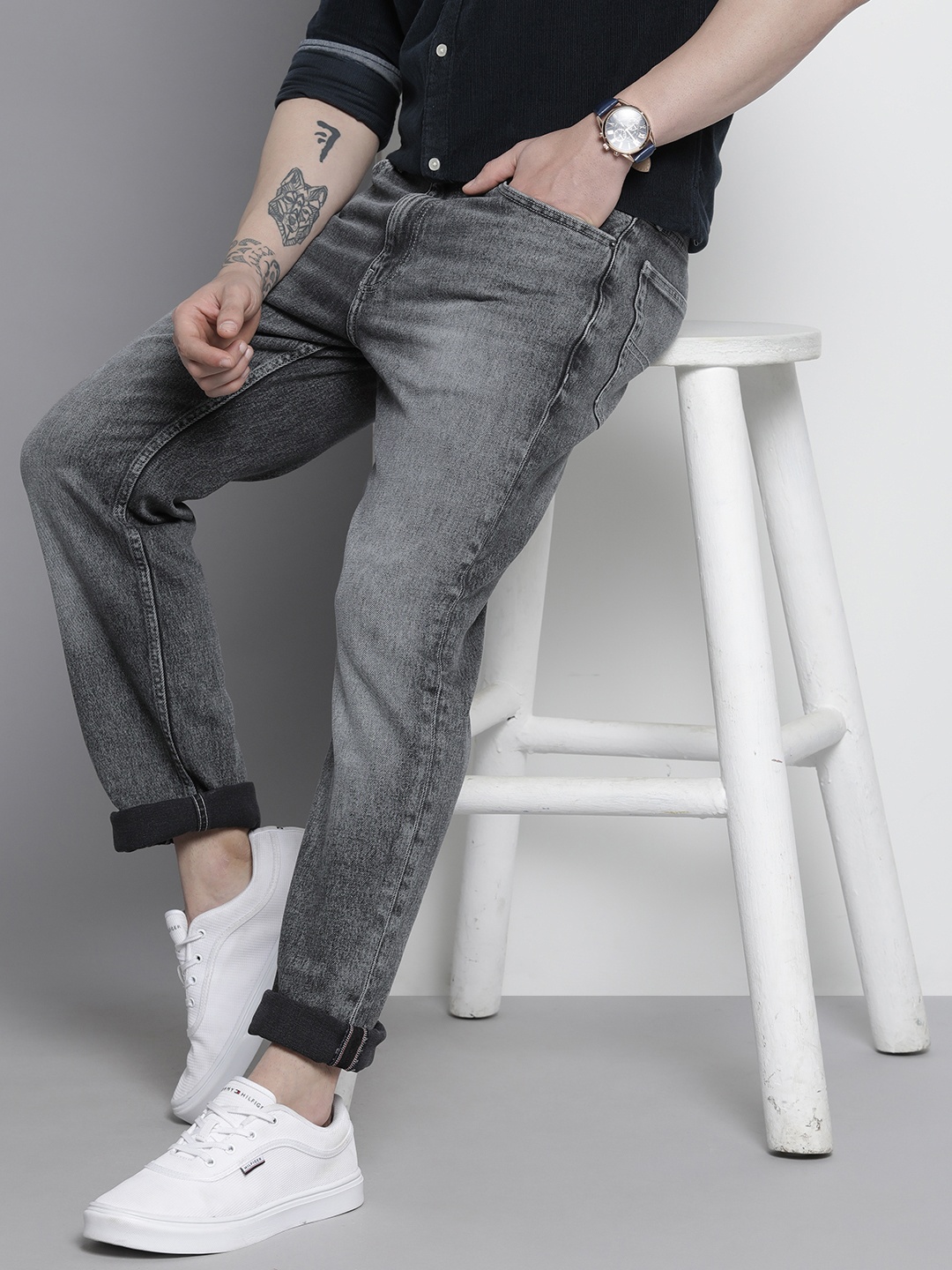 

Tommy Hilfiger Men Relaxed Fit Heavy Fade Stretchable Jeans, Black