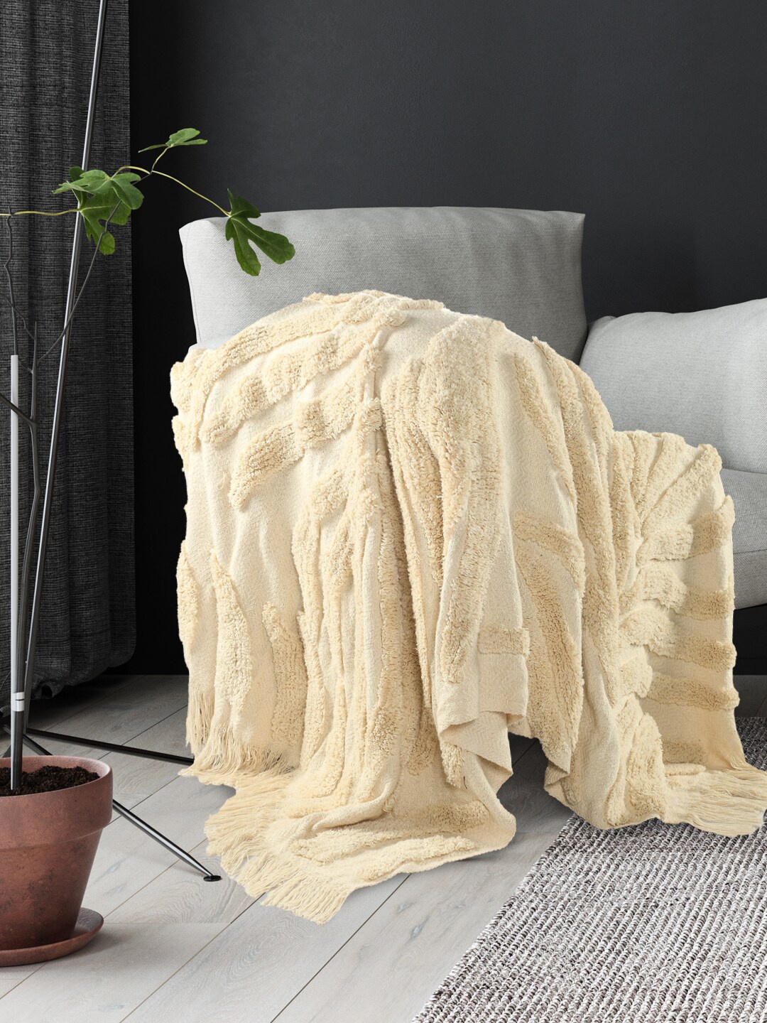 

SASHAA WORLD Cream Colored Self Design Cotton Throws