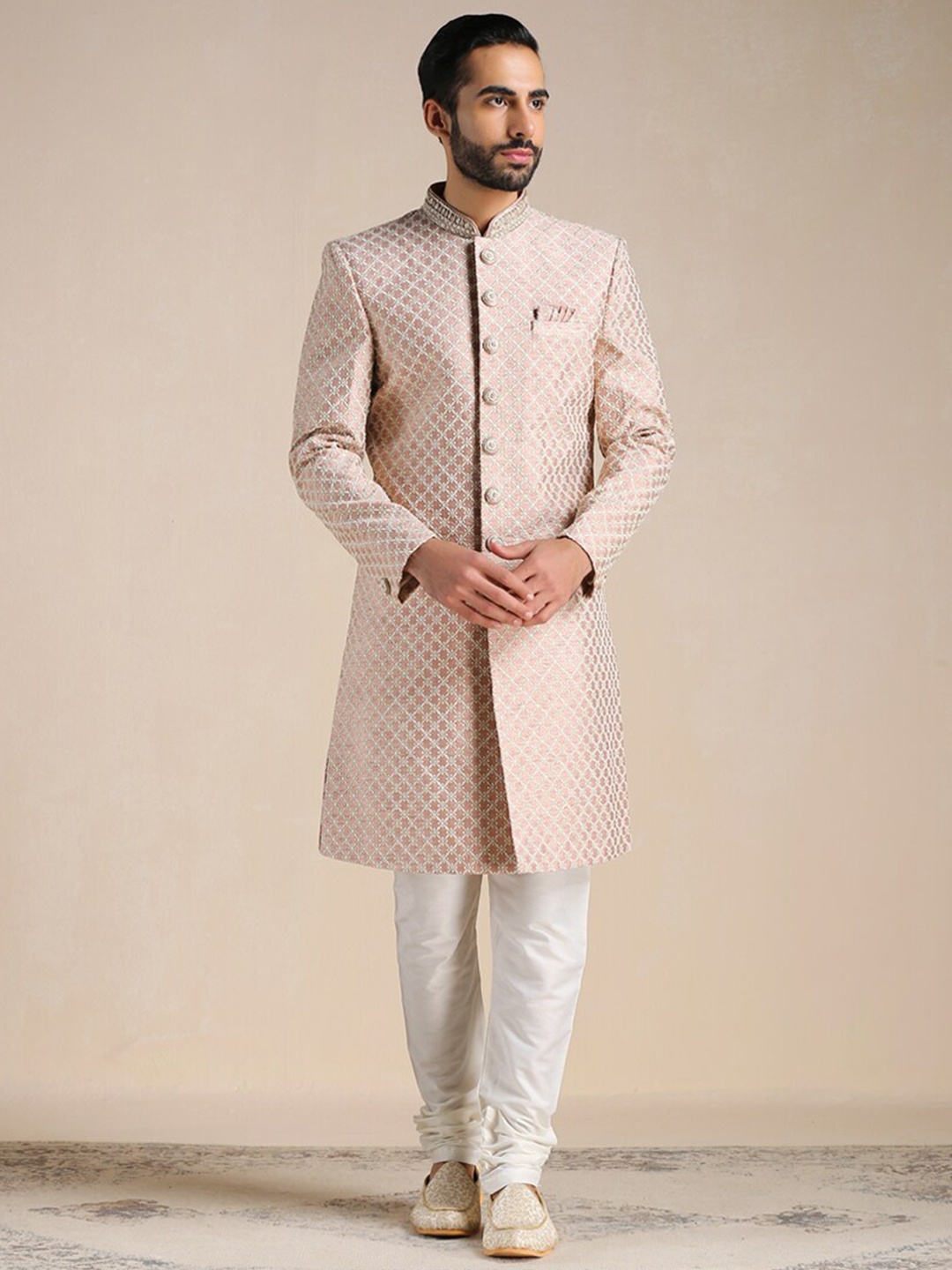 

Manyavar Men Art Silk All Over Self Design Sherwani & Churidar Set, Coral