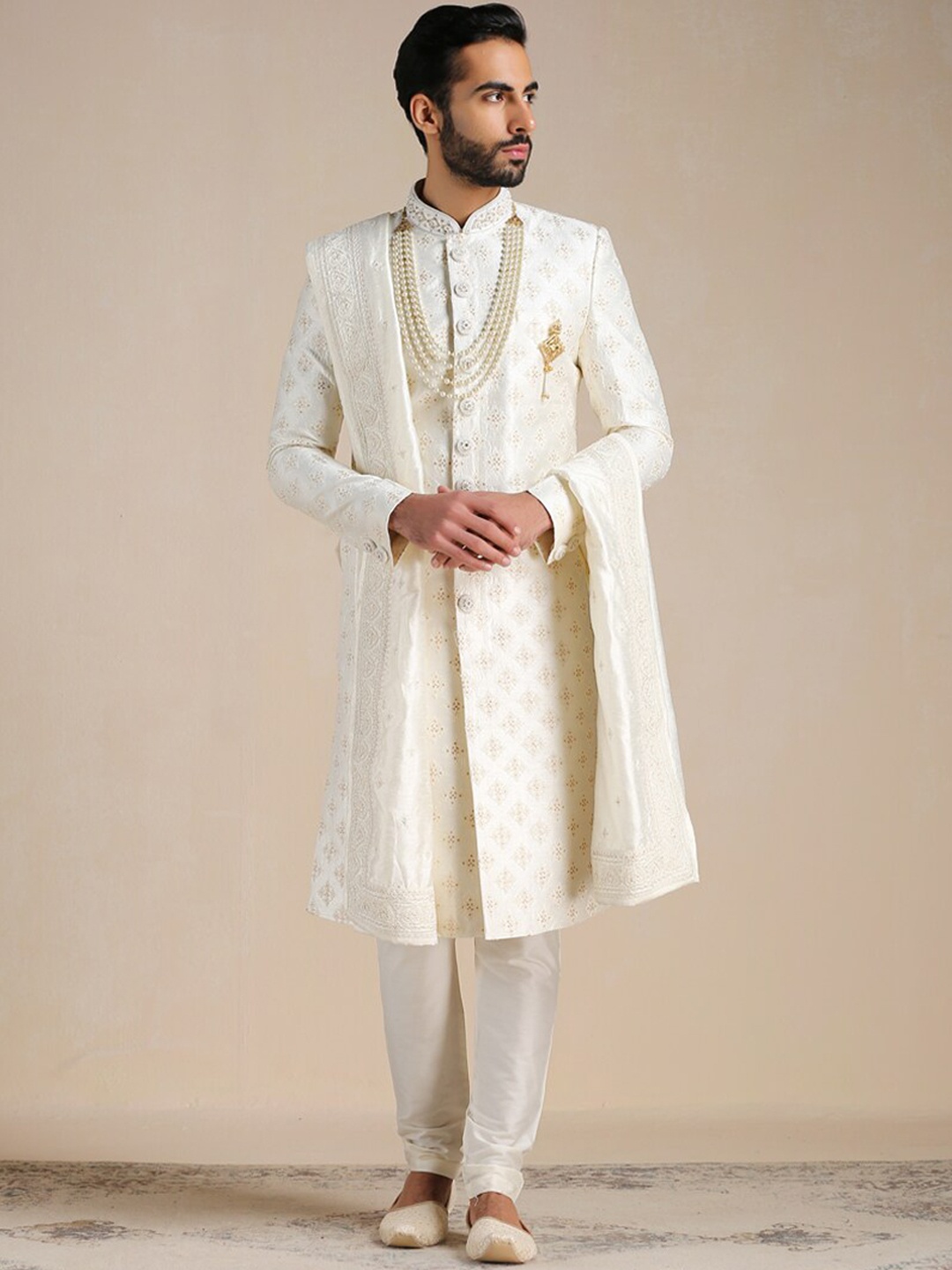 

Manyavar Men Self-Design Art Silk Full Sleeves Sherwani Set, Cream