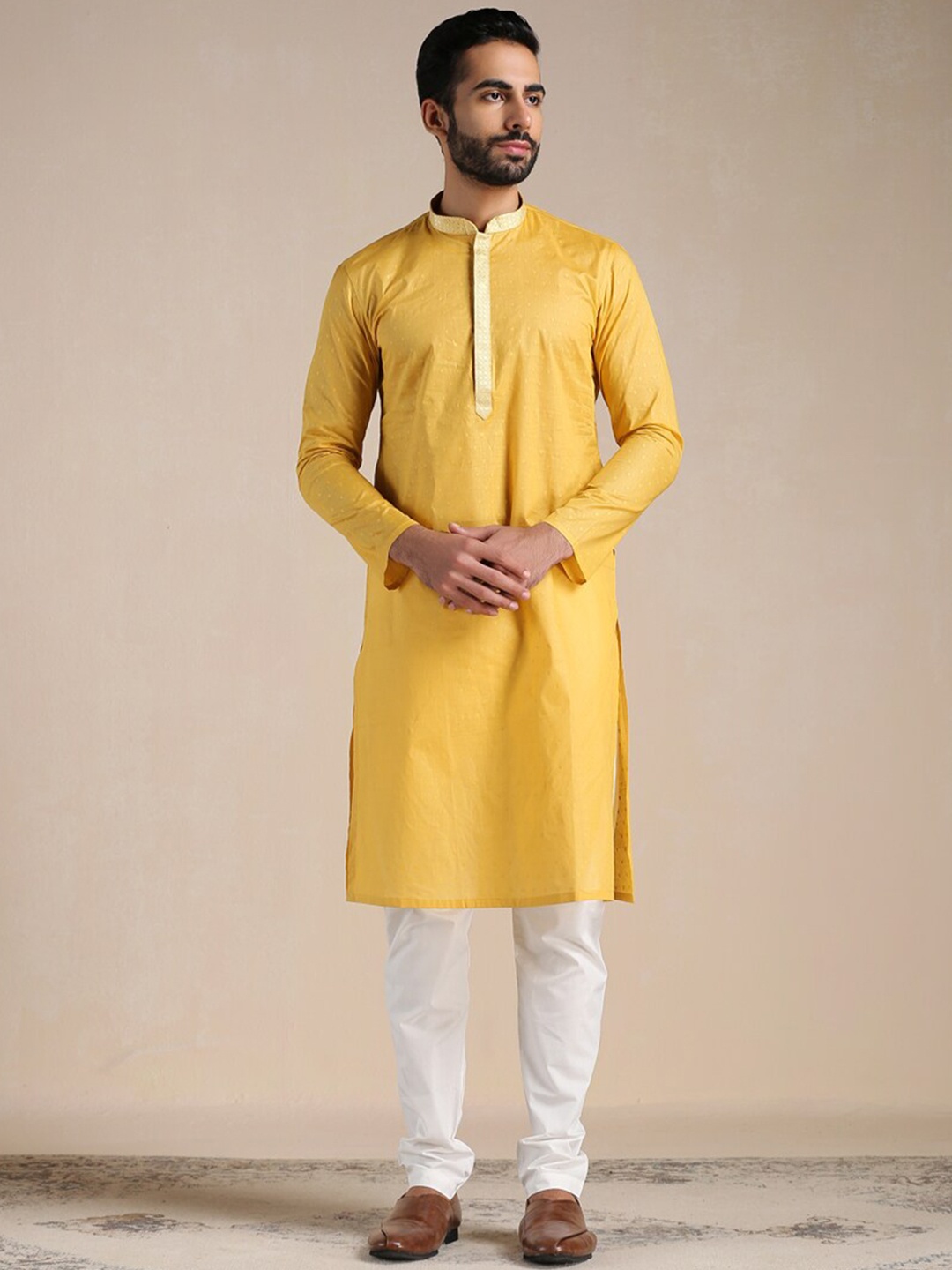 

Manyavar Men Pure Cotton Kurta with Churidar, Yellow