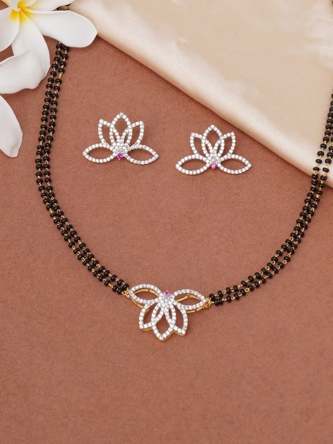 

Voylla Women Gold-Plated Beaded & CZ Studded Mangalsutra Set, Black