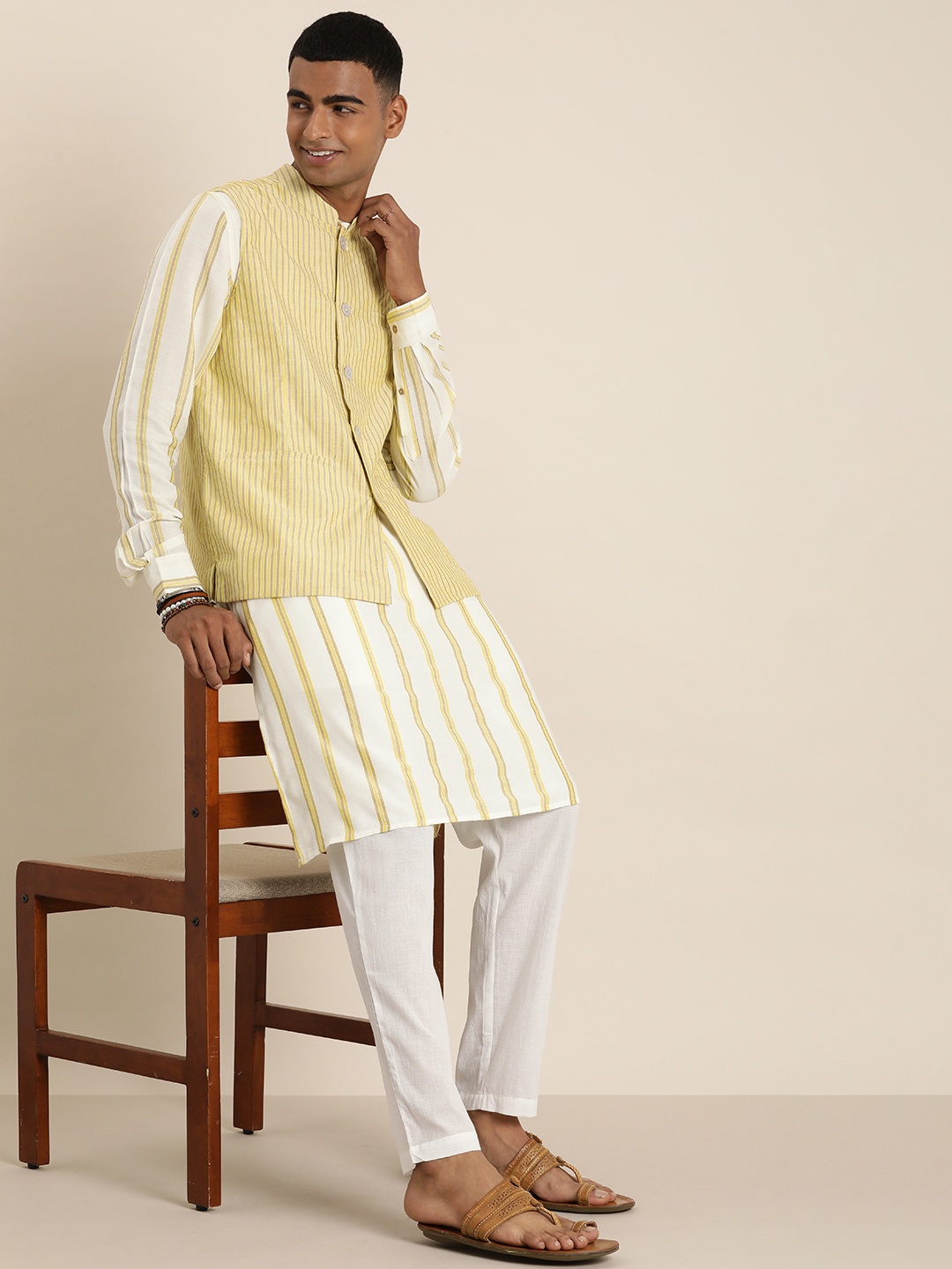 

Taavi Men Woven Legacy Striped Regular Pure Cotton Kurta with Trousers, Yellow