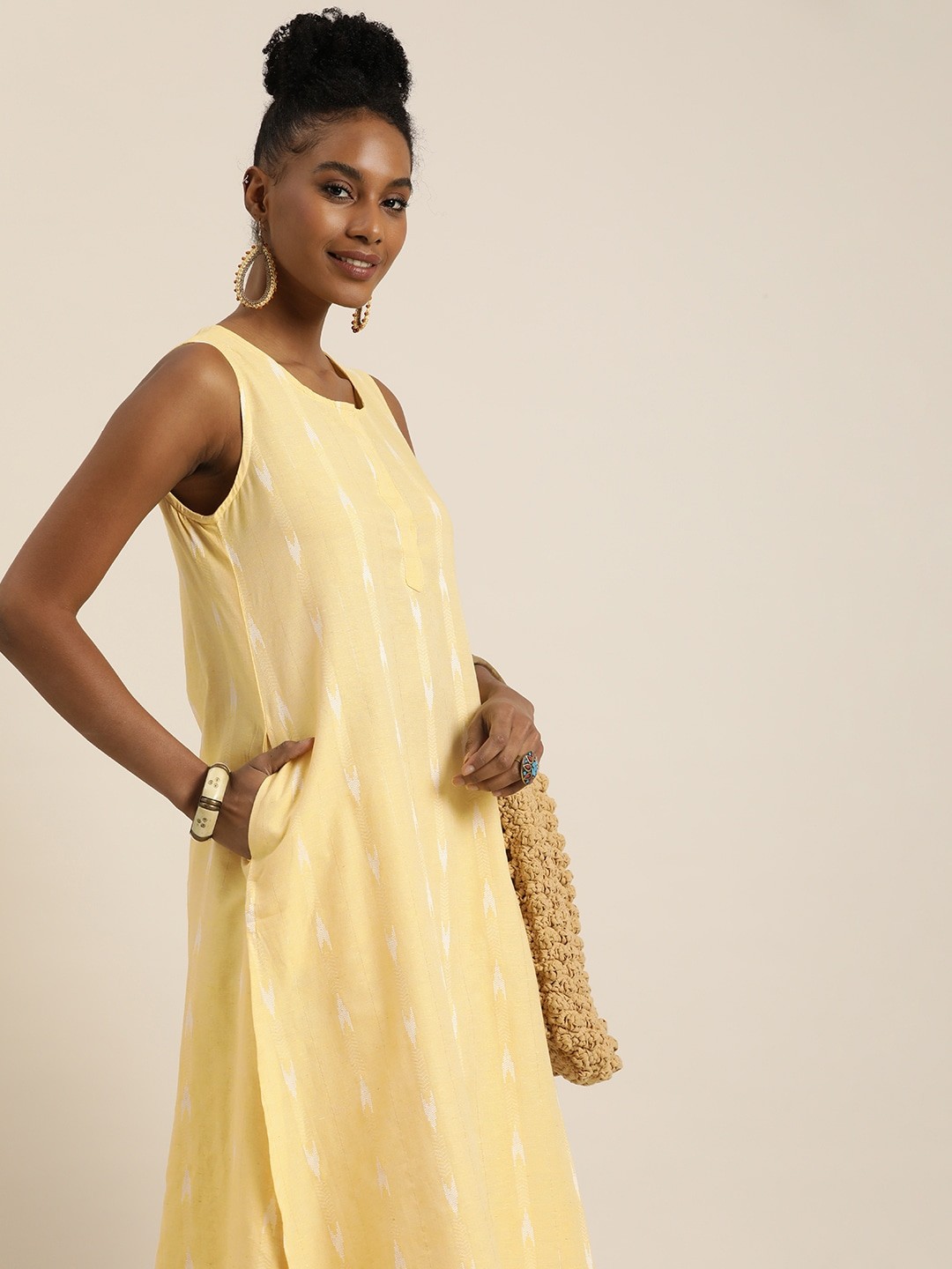

Taavi Sleeveless Round Neck Woven Design Woven Legacy Kurta, Yellow