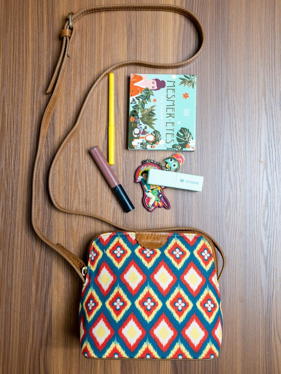 

Chumbak Ethnic Motifs Printed Structured Sling Bag, Tan
