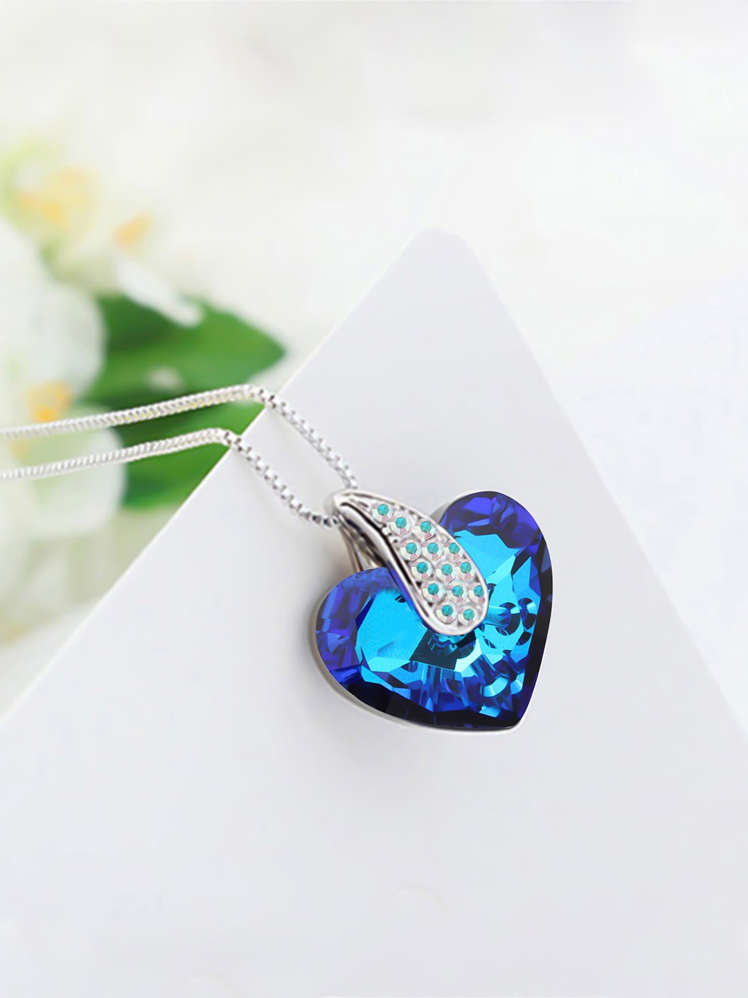 

Yellow Chimes Swarovski Crystal Studded Heart Shaped Pendant With Chain, Blue