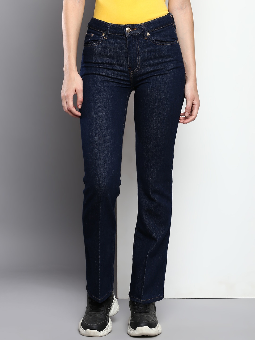 

Tommy Hilfiger Women Bootcut Light Fade Cotton Jeans, Blue