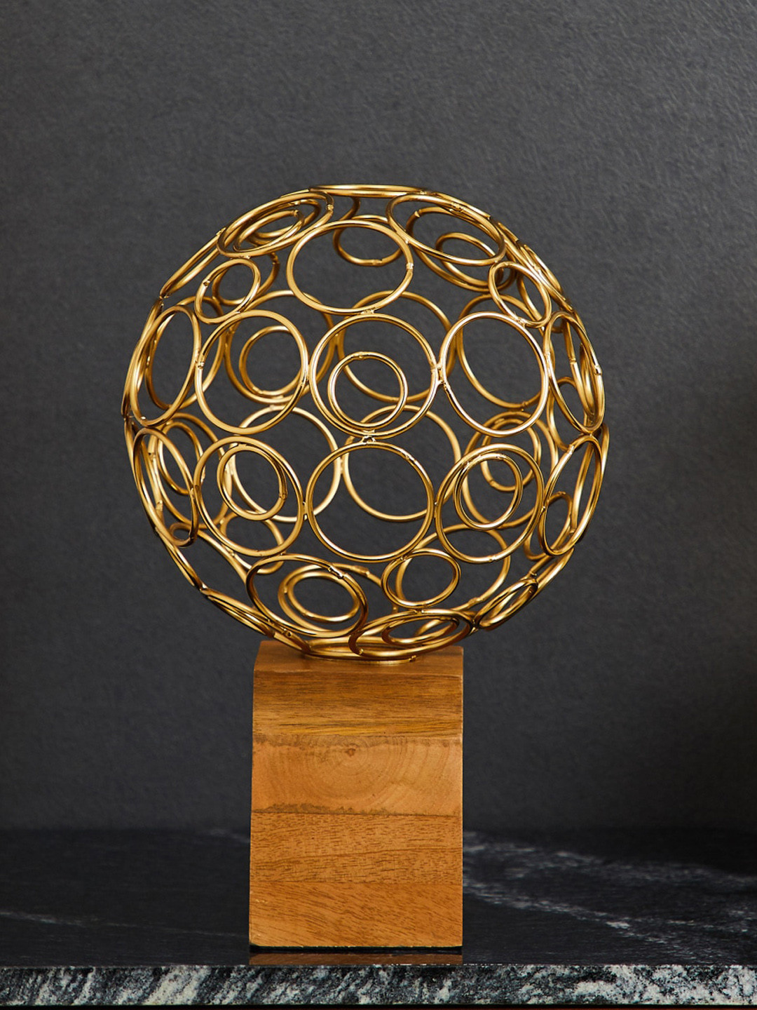 

Home Centre Gold Rush Gold & Brown Textured Steel Ring With Wood Stand