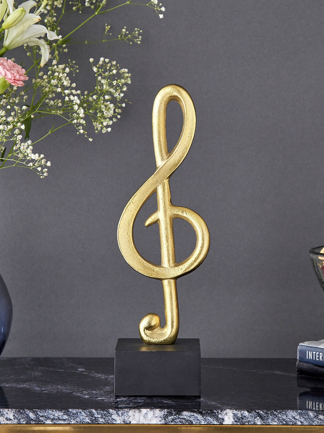 

Home Centre Gold-Toned & Black Textured Musical Note Table Accent Showpieces