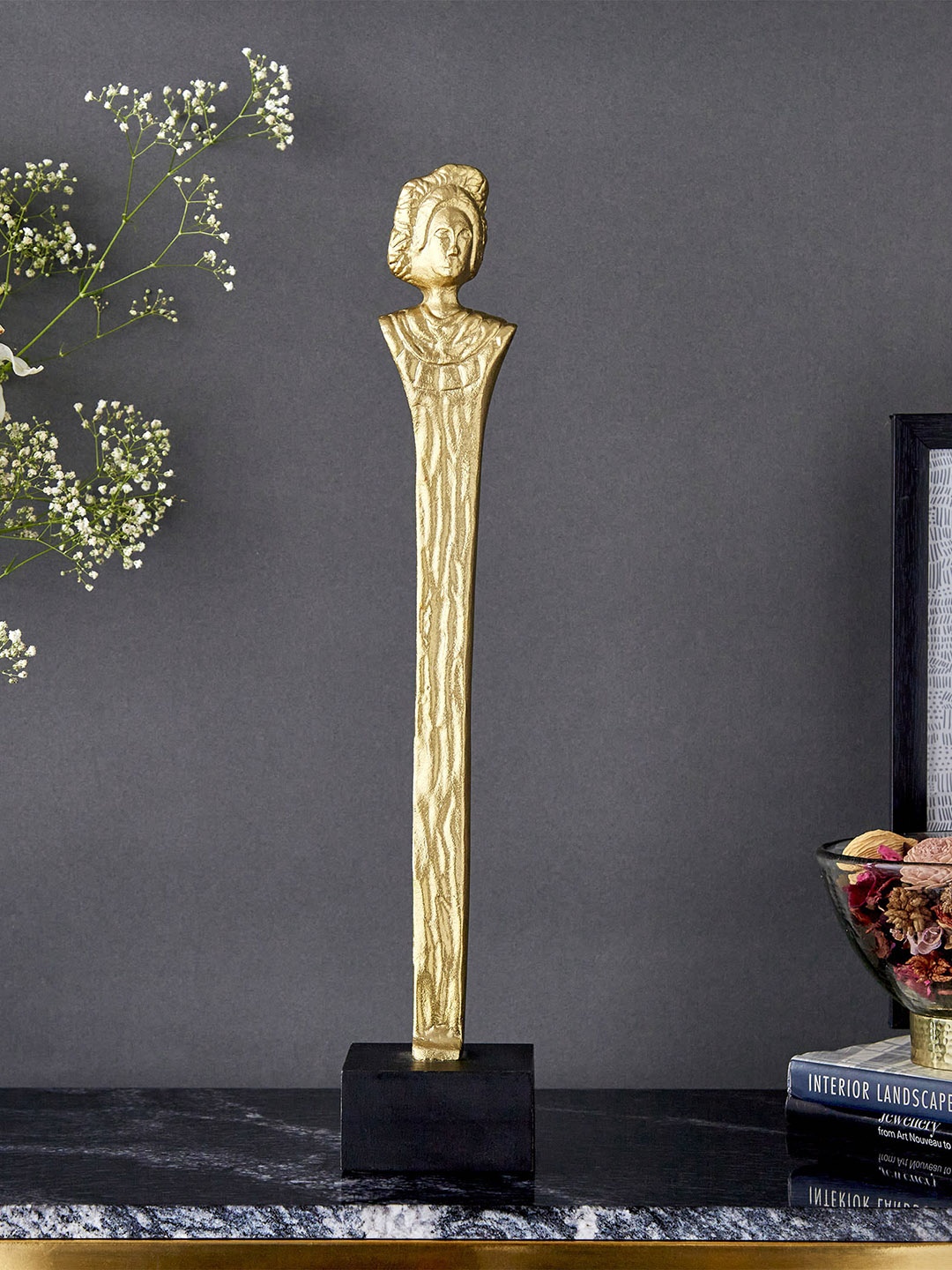 

Home Centre Eternity Gold-Toned & Black Textured Aluminum Roman Queen Sculpture Table Accent