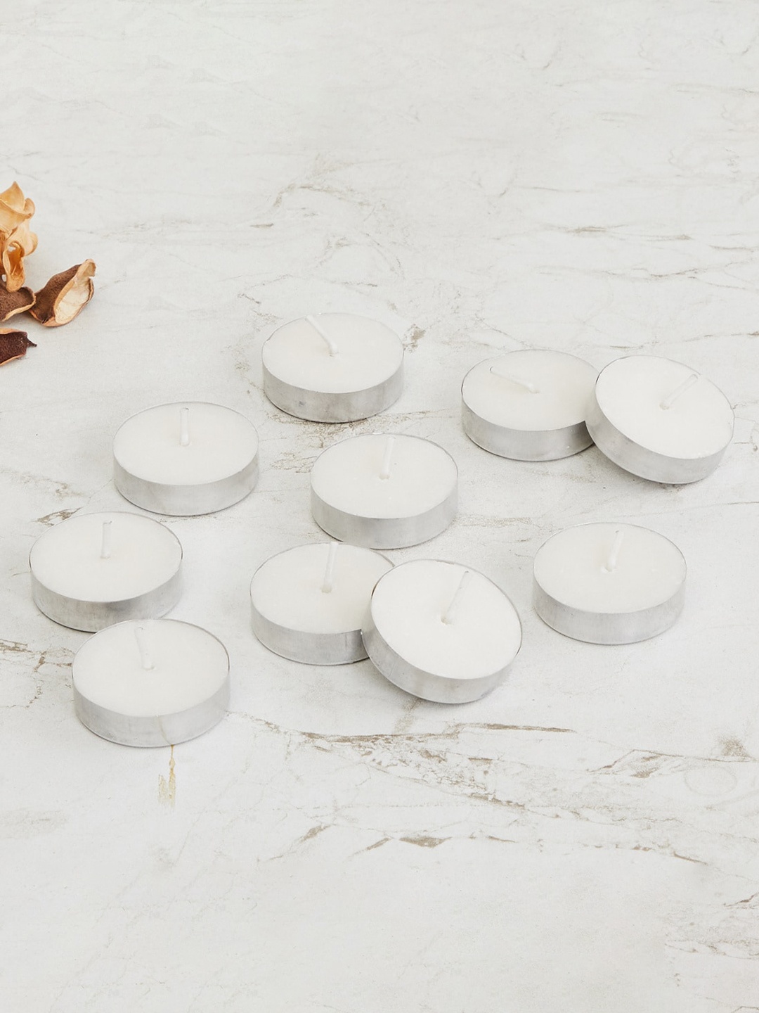 

Home Centre Set Of 10 Marshmallow Votives Wax Candles, White