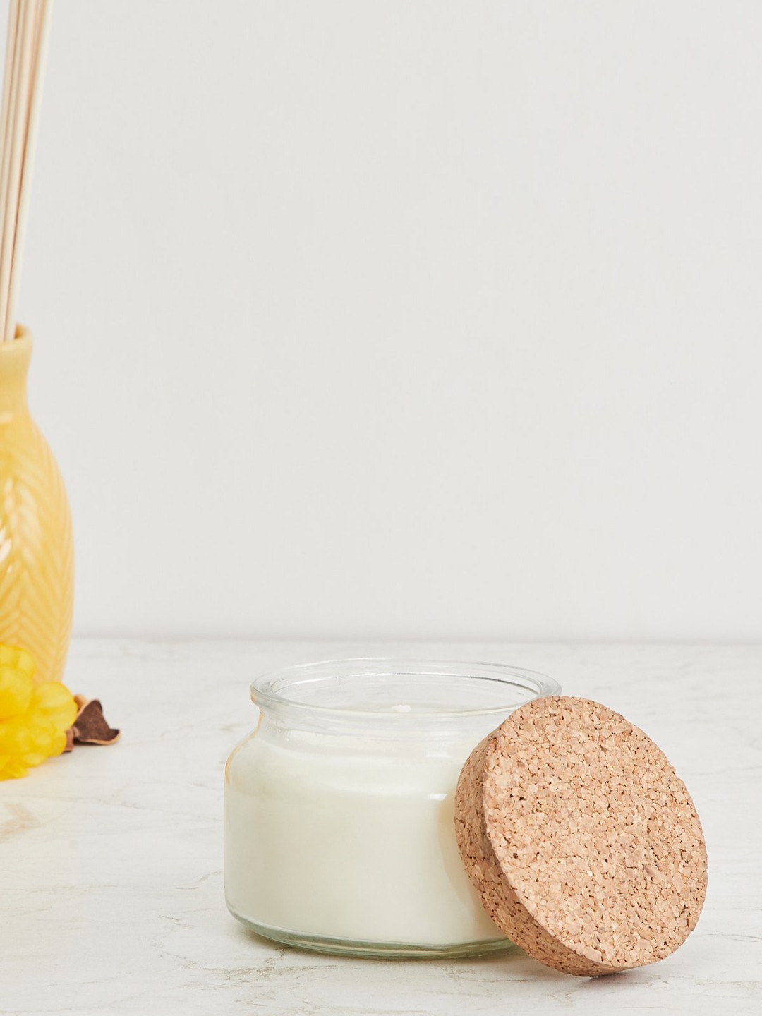 

Home Centre Beige Vanilla Scented Jar Candle With Lid