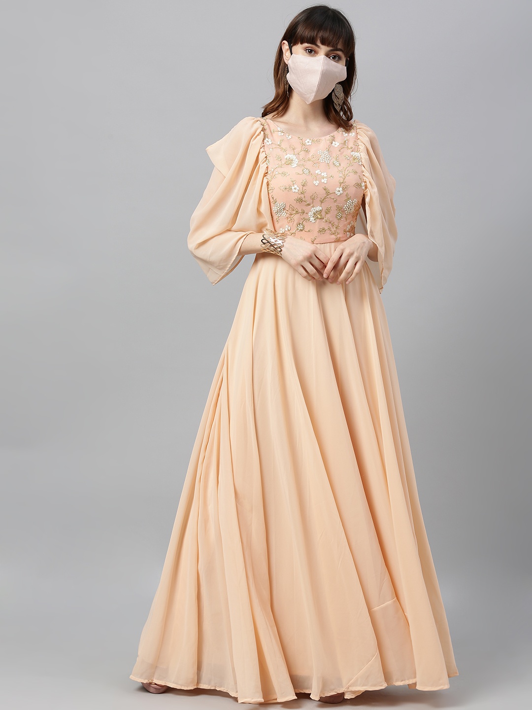 

Ethnovog Ready To Wear Peach Embroidered Round Neck Gown