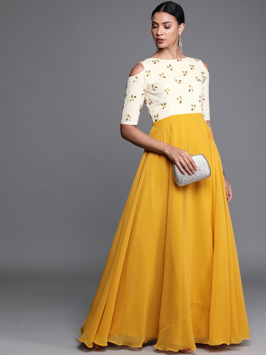 

Ethnovog Ready To Wear Yellow Embroidered Boat Neckline Gown
