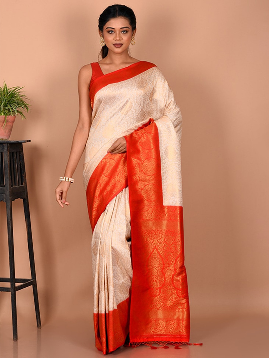 

AllSilks White & Orange Woven Design Zari Silk Blend Saree