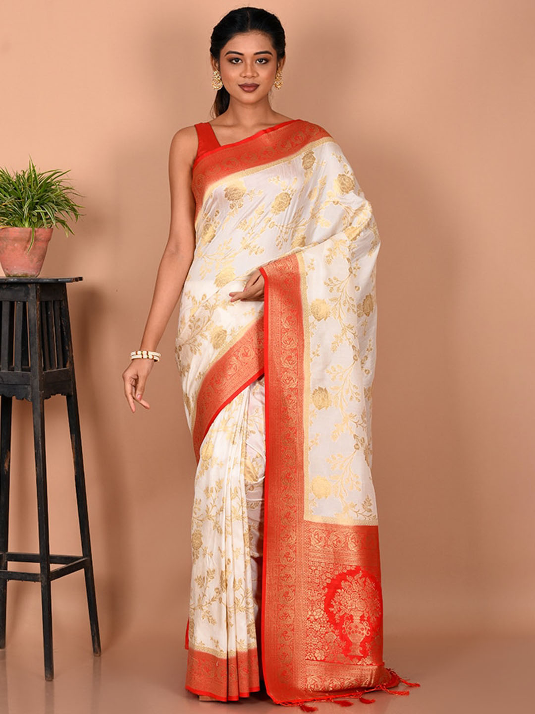 

AllSilks White & Orange Floral Zari Silk Blend Saree