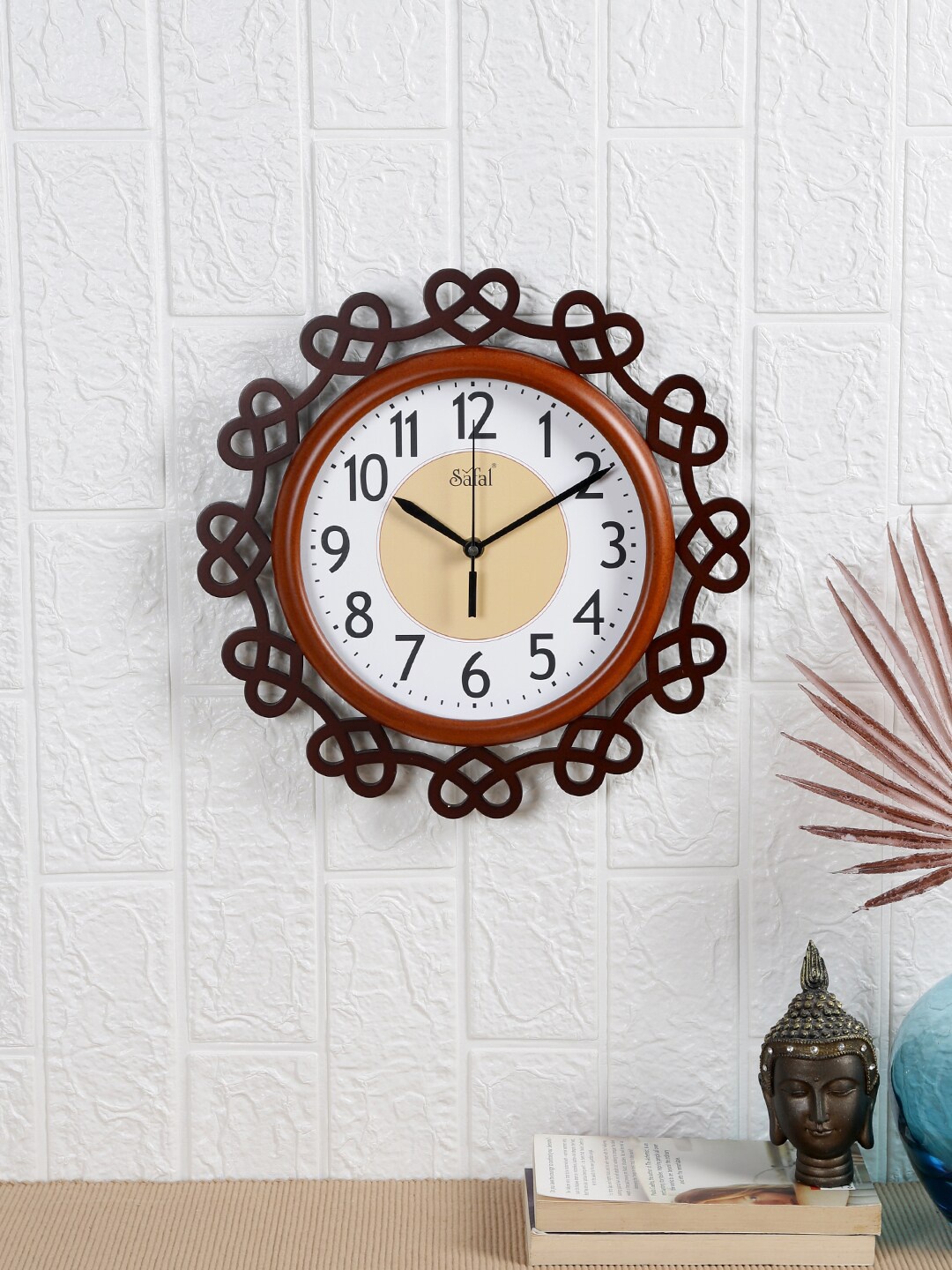 

Safal Brown & Black Abstract Shaped Contemporary Wall Clock