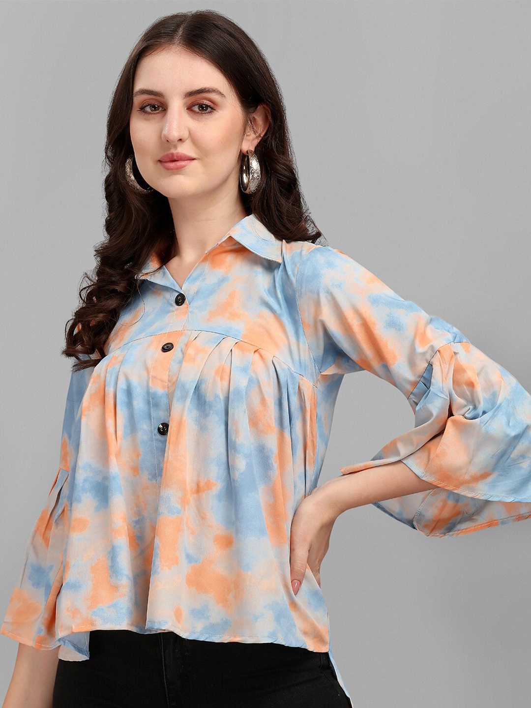 

Amrutam Fab Abstract Printed Crepe Empire Top, Peach