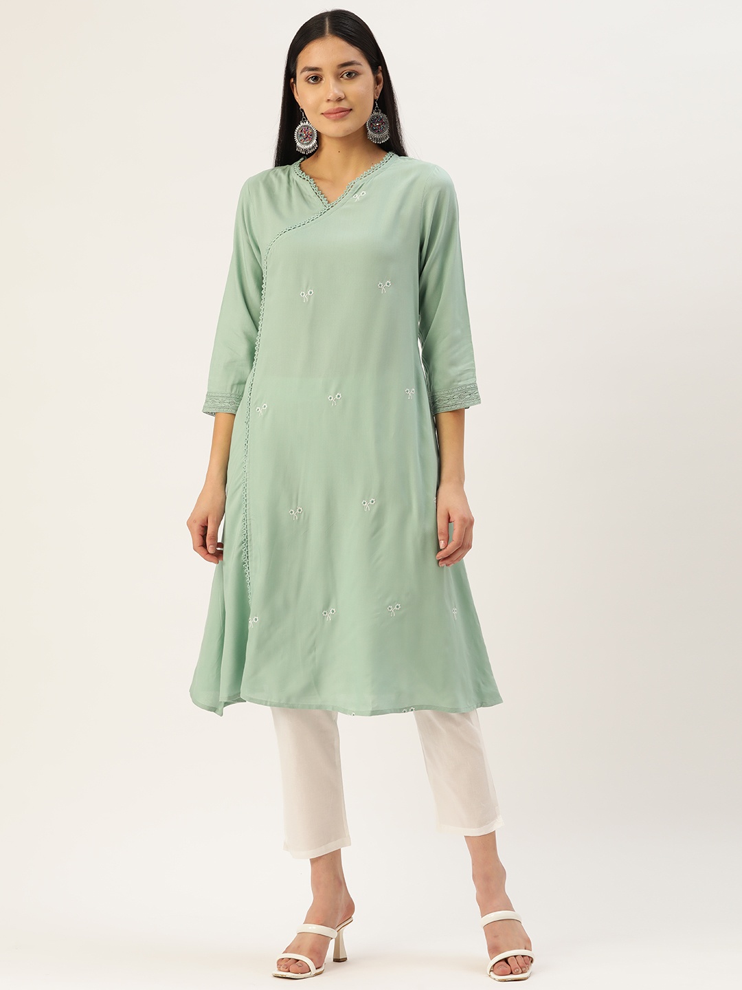 

MISRI Women Sea Green Floral Embroidered Kurta with Trousers