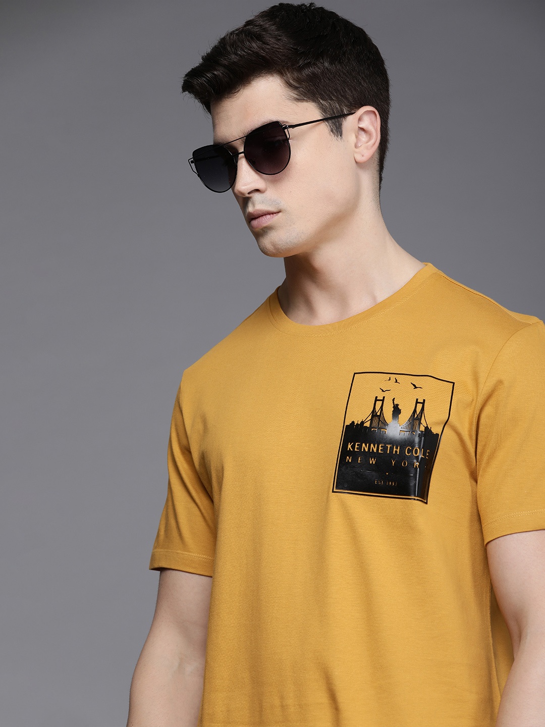 

Kenneth Cole Men Mustard Yellow & Black Printed Pure Cotton Applique T-shirt