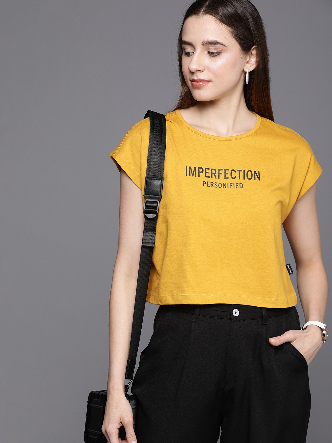 

Kenneth Cole Voice Tee Women Yellow Typography Printed Pure Cotton T-shirt, Mustard