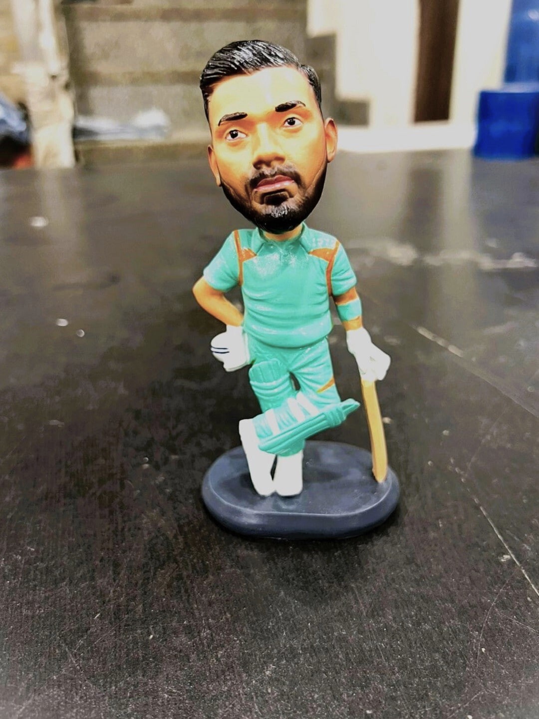 

Awestuffs Turquoise Blue Textured KL Car Decoration Bobblehead Action Figure