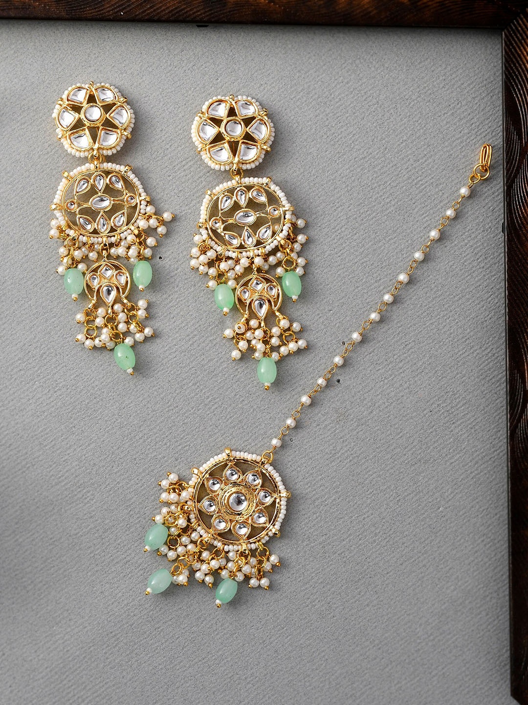 

DASTOOR Gold Plated & Green Mangtikka Earring set
