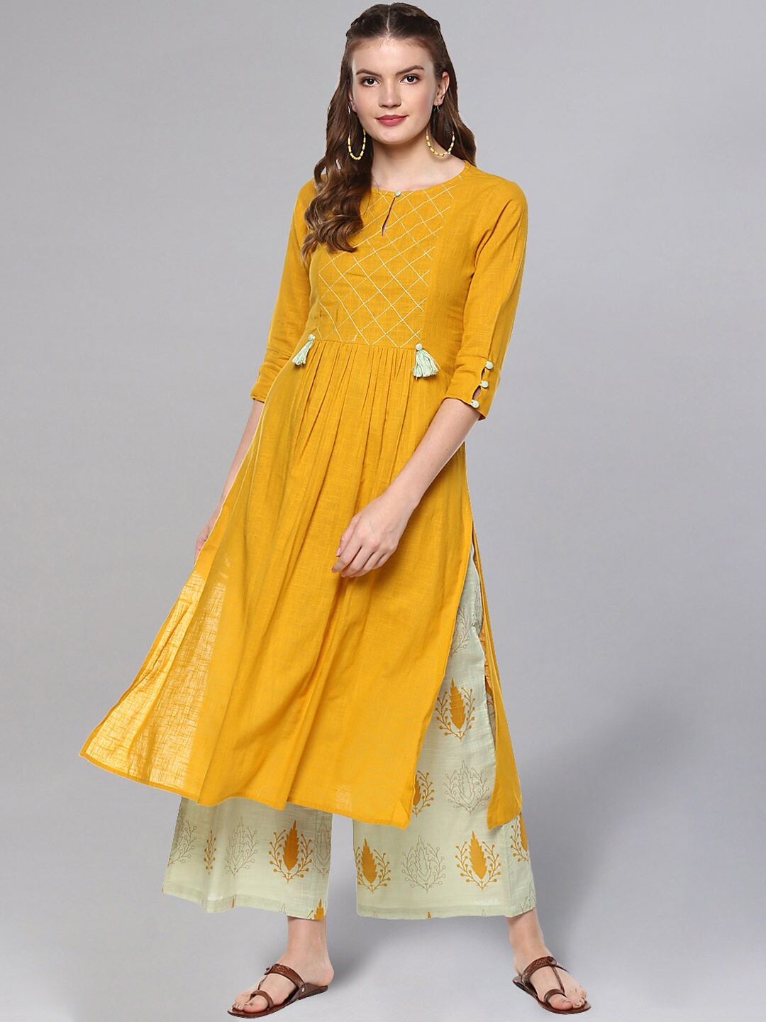 

Idalia Women Thread Work Kurta with Palazzos, Mustard