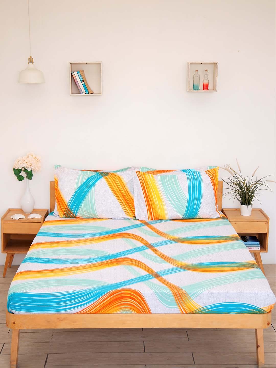 

Ariana Blue & Orange 144 TC Soft Queen Bedsheet with 2 Pillow Covers