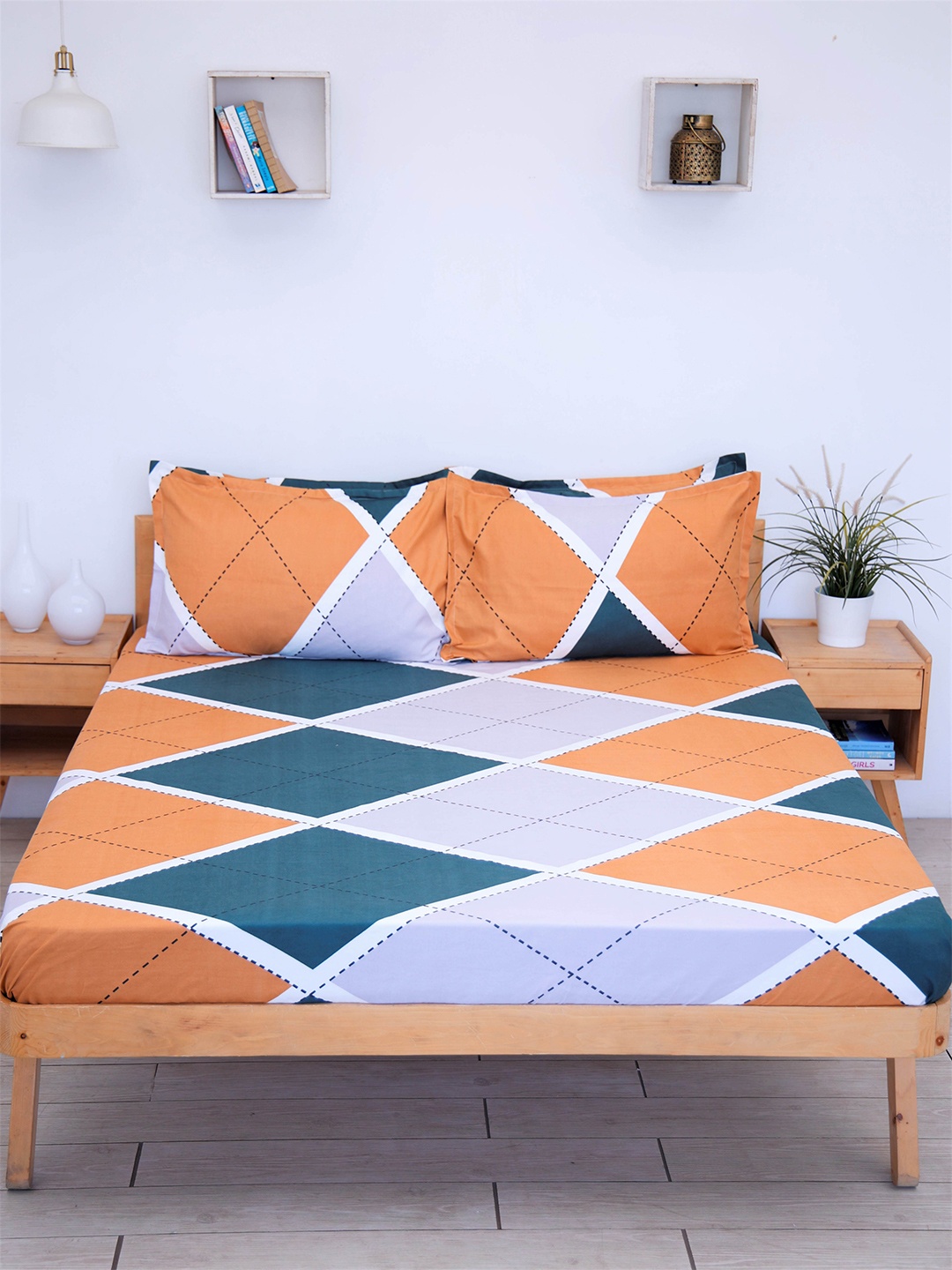 

Ariana Orange & Blue Geometric 144 TC Queen Bedsheet with 2 Pillow Covers