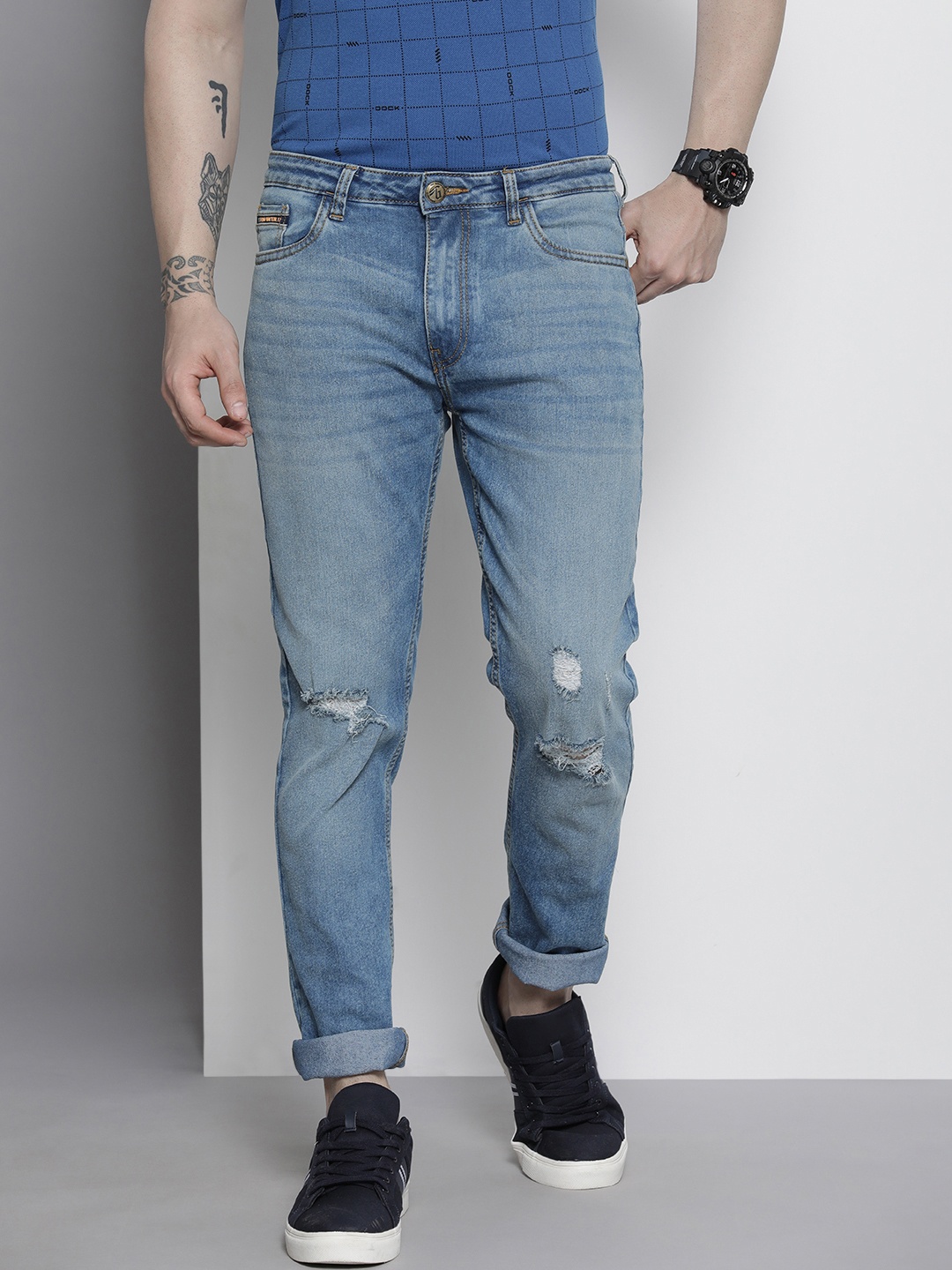 

The Indian Garage Co Men Blue Slim Fit Mildly Distressed Stretchable Jeans
