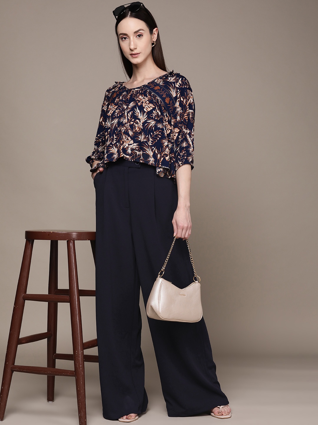

Label Ritu Kumar Women Solid Flared Pleated Trousers, Navy blue