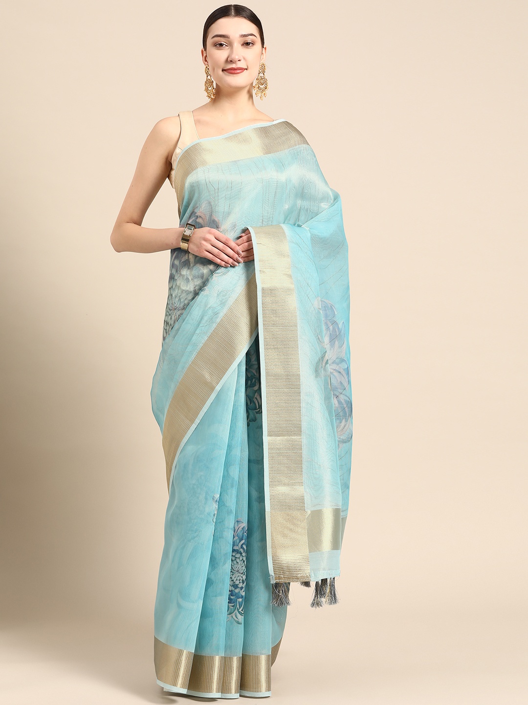 

ZARI Turquoise Blue Floral Zari Organza Saree