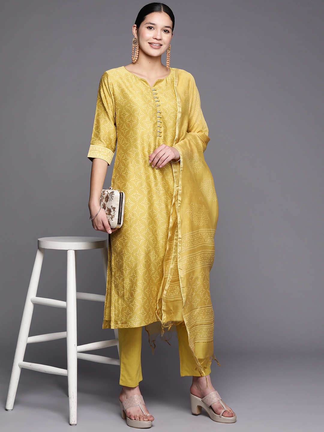 

Libas Women Ethnic Motifs Printed Chanderi Silk Kurta With Trousers & With Dupatta, Mustard