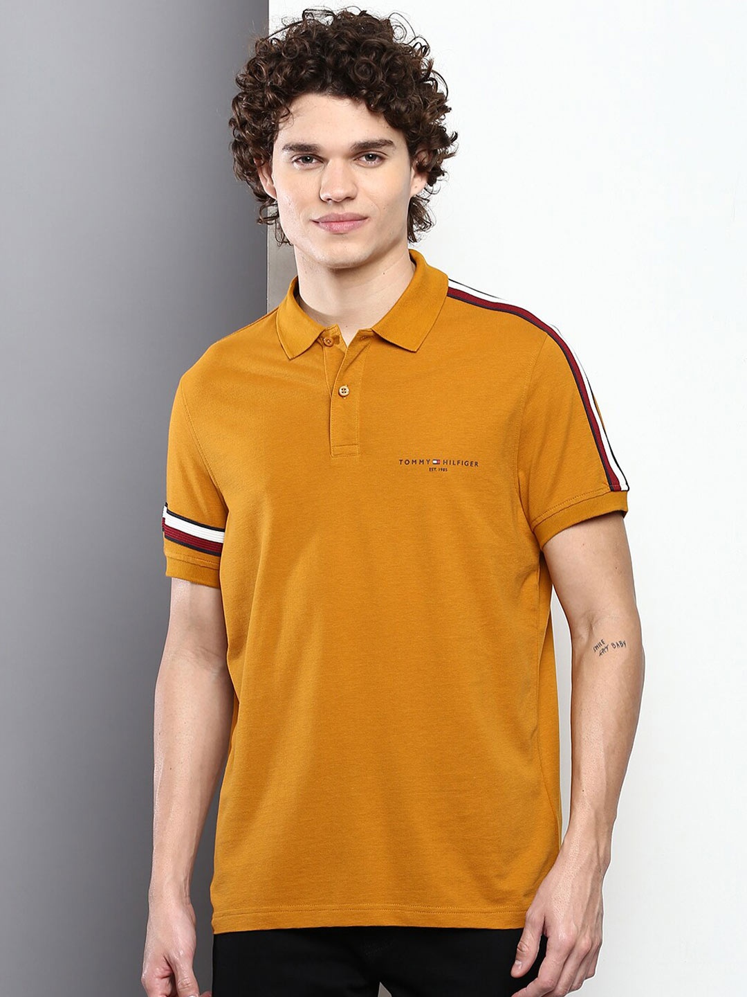 

Tommy Hilfiger Men Polo Collar Cotton T-shirt, Mustard