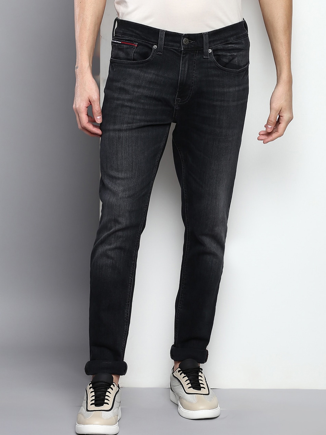 

Tommy Hilfiger Men Cotton Tapered Fit Mid-Rise Jeans, Black