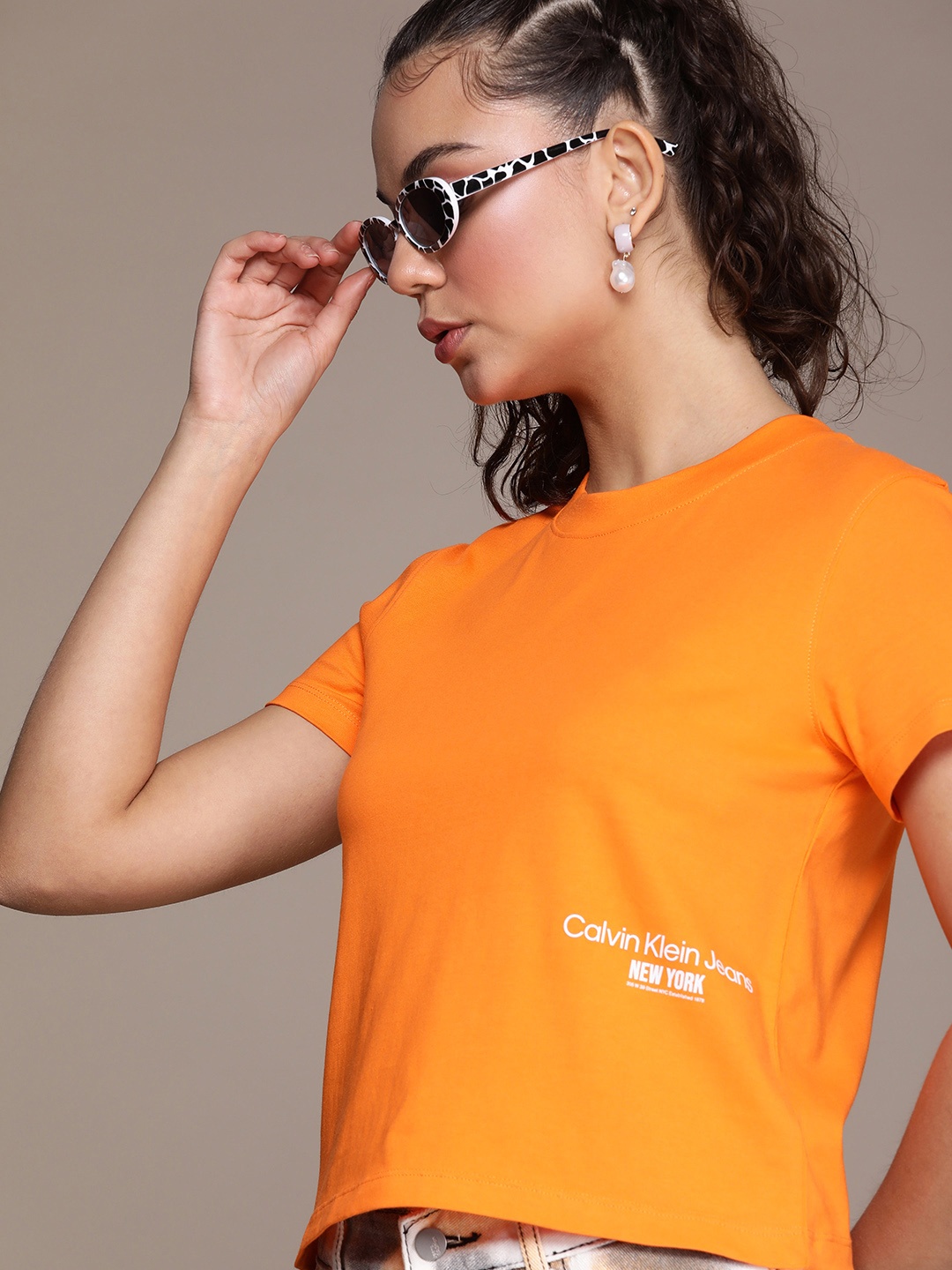 

Calvin Klein Jeans Pure Cotton Brand Logo T-shirt, Orange