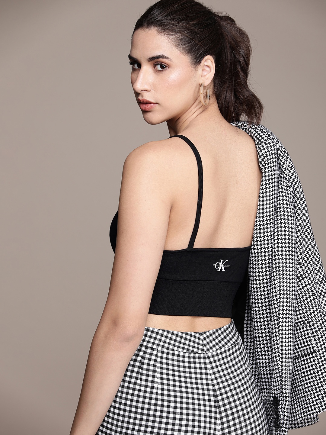 

Calvin Klein Jeans Brand Logo Printed Bralette Crop Top, Black